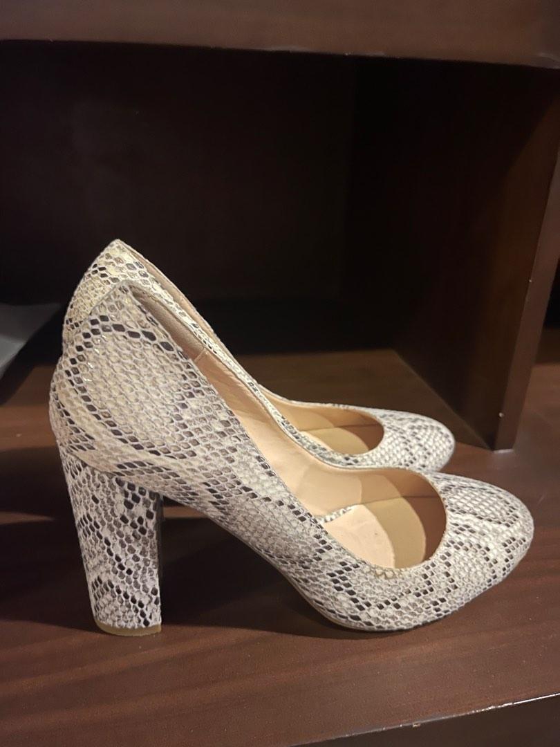 high heels with snakes