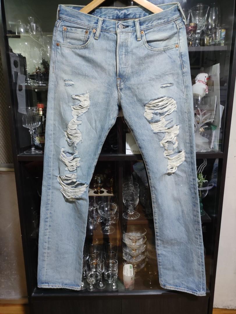 Levis 501 ripped jeans, Men's Fashion, Bottoms, Jeans on Carousell