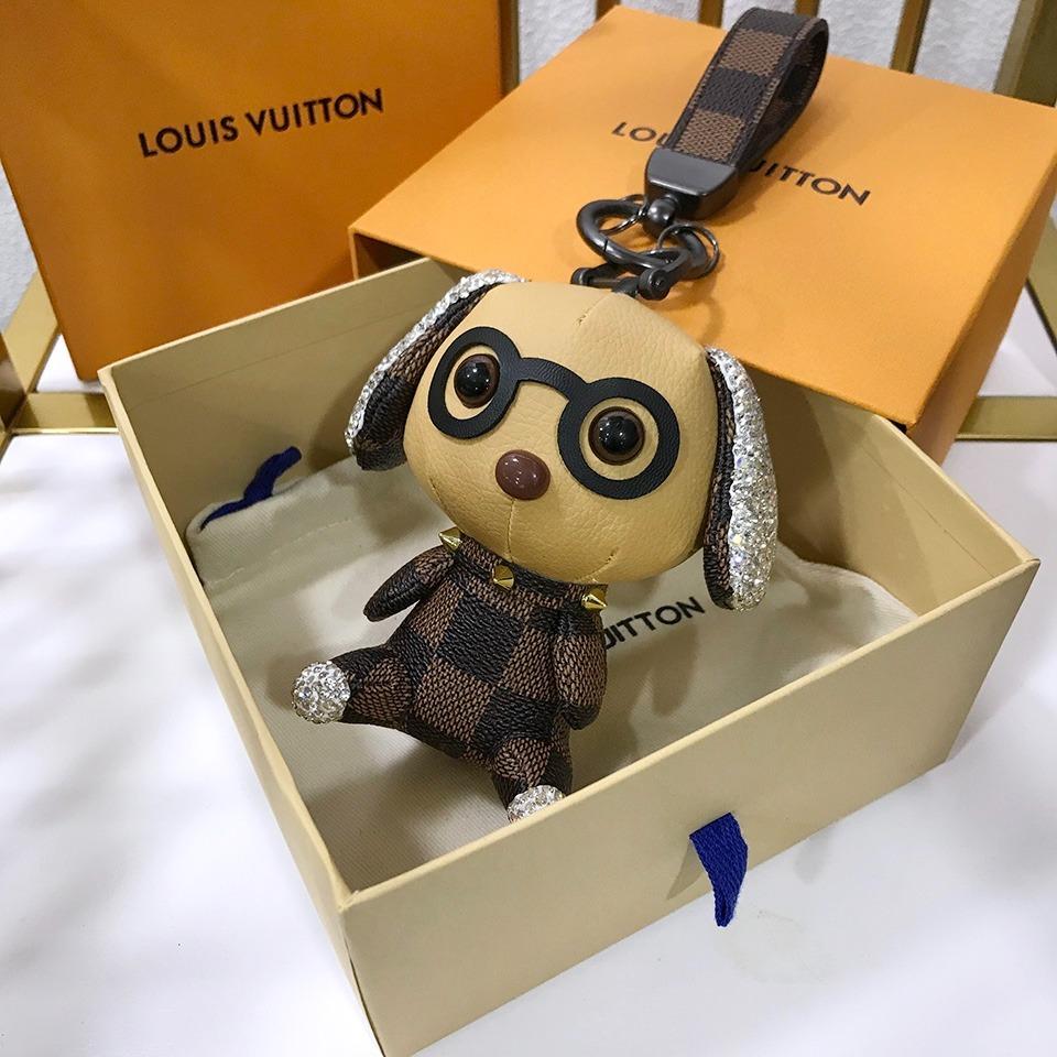 LV dog keychain super cute as gift, Women's Fashion, Watches & Accessories,  Other Accessories on Carousell