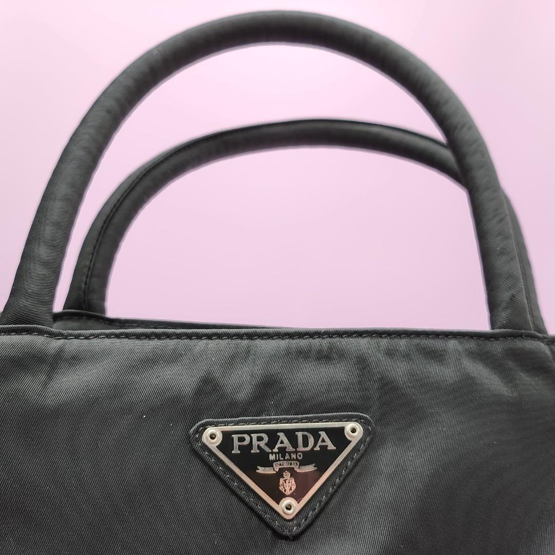 Closing Sale! Prada Tessuto Nylon Hand Bag (Category: Luxury Bags & Wallets) located in Santa Cruz. Submitted by MillesimeCollection (Listing ID 1185863949, Image 3). Description: Rank A with Authenticity Card Free Shipping.