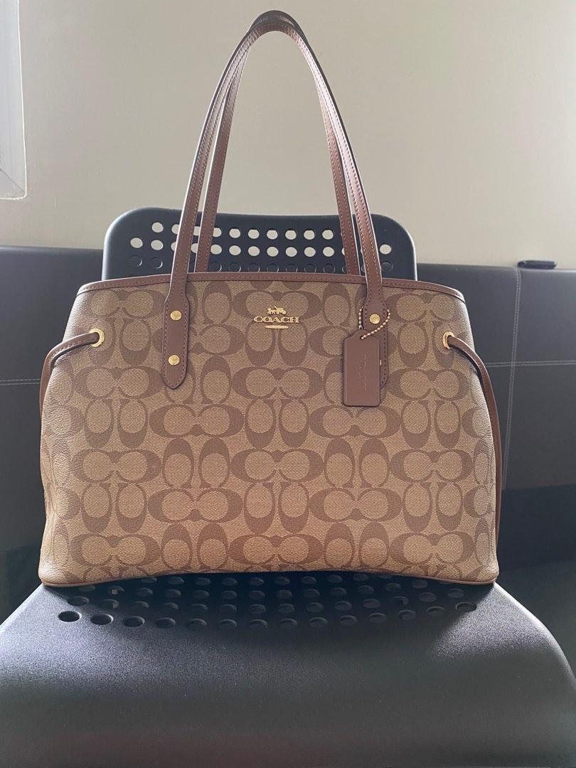 Coach drawstring carryall shoulder bag in signature Khaki Saddle