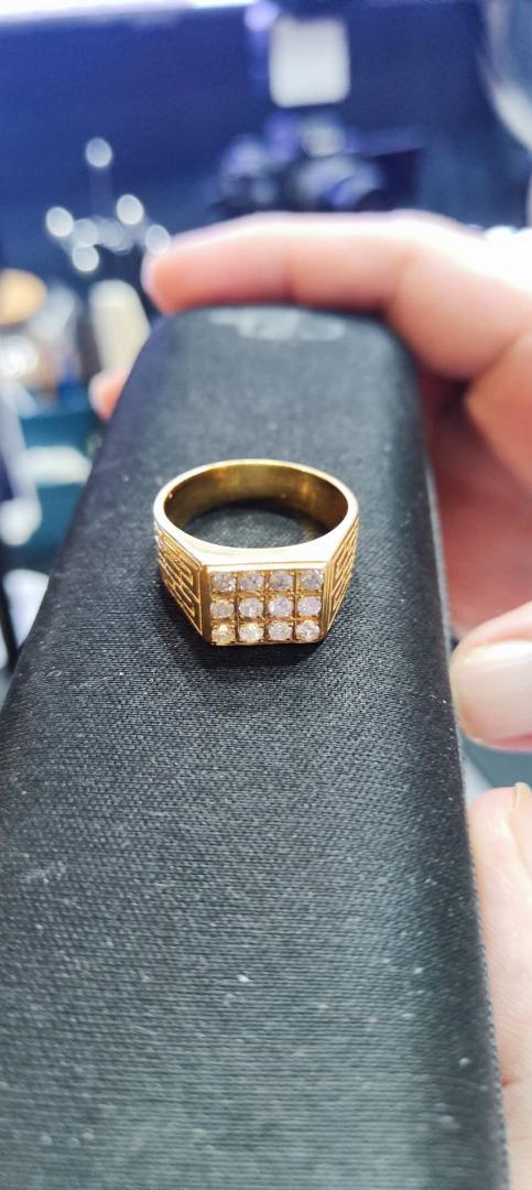 Diamond Ring for Men solid gold (Category: Jewelry) located in Antipolo. Submitted by patchsky (Listing ID 1182361944, Image 3). Description: Bought 55k from a jewelry store. Twelve small diamonds almost 2ct VS1 clarity, HK Setting. 14k solid gold at 10.7 grams. Good for big fingers, size 11-12. 0*9*3*6*9*4*4*0*1*6*0 Available for a meetup around the Marikina area for checking. RFS: too much jewelry already.