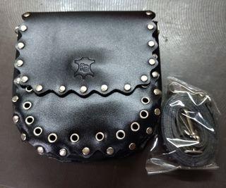 Rivo Studded bucket bag with shoulder strap in cowhide leather