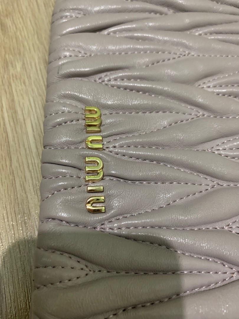Miu Miu Clutch Bag (Category: Luxury Bags & Wallets) located in Tarlac. Submitted by ae01019x (Listing ID 1182343510, Image 2). Description: With signs of used missing metal strap holder on other side condition: 9/10 payment first.