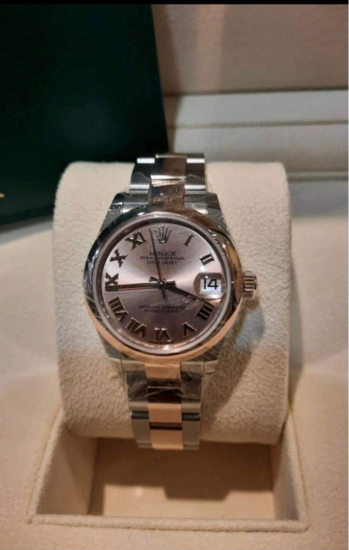*Rolex 2022 datejust 2 tone Rosegold (Category: Luxury Watches) located in Pasig City. Submitted by Watchaholics (Listing ID 1182424240, Image 1). Description: *Rolex datejust 2 tone rosegold *pink salmon dial *31 mm *complete with box and papers *2022 year model *.