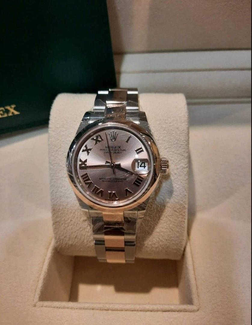 *Rolex 2022 datejust 2 tone Rosegold (Category: Luxury Watches) located in Pasig City. Submitted by Watchaholics (Listing ID 1182424240, Image 2). Description: *Rolex datejust 2 tone rosegold *pink salmon dial *31 mm *complete with box and papers *2022 year model *.