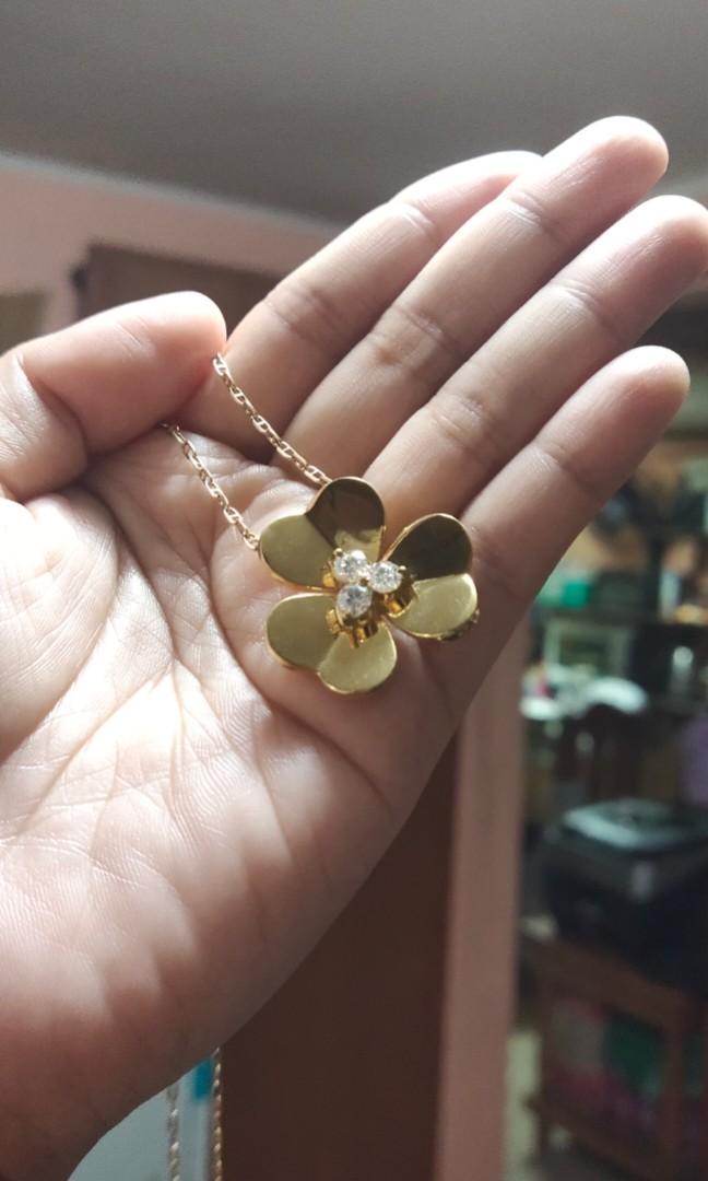 VCAFrivole set / Flower jewelry set (Category: Body Jewelry) located in Taguig. Submitted by glaigee (Listing ID 1182372871, Image 3). Description: frivole set : pendant, ring and earrings (clip type) in 18k yellow gold with moissanite stones free ring resize Very pretty in actual and almost the same copy as the original as HK made This item is cheaper compared to HK setting in the market which is kinda small than this but too pricey. So this one
