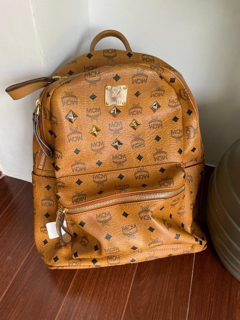 Legit MCM backpack turnable screws, Luxury, Bags & Wallets on Carousell