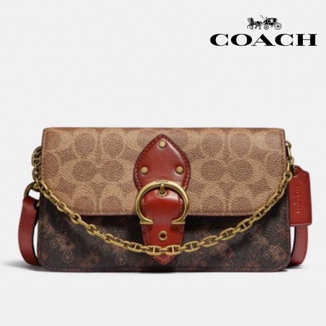 Coach signature hotsell crossbody clutch