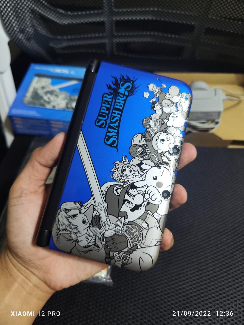 Nintendo 3DS xl smash bros limited edition blue good as new, Video