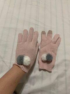 Pink gloves with cute pompoms