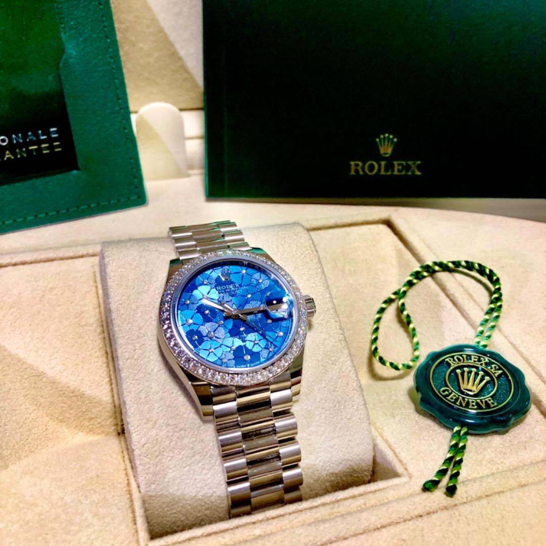 rolex diamond bezel price