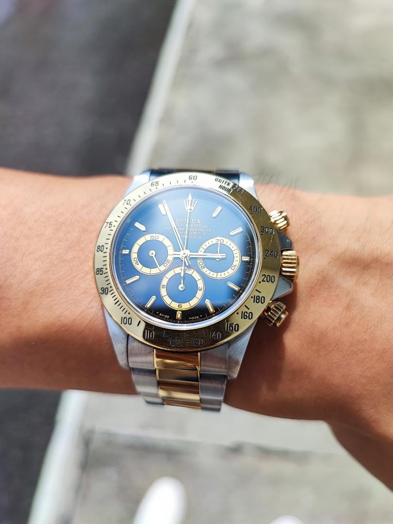 Rolex daytona best sale service cost