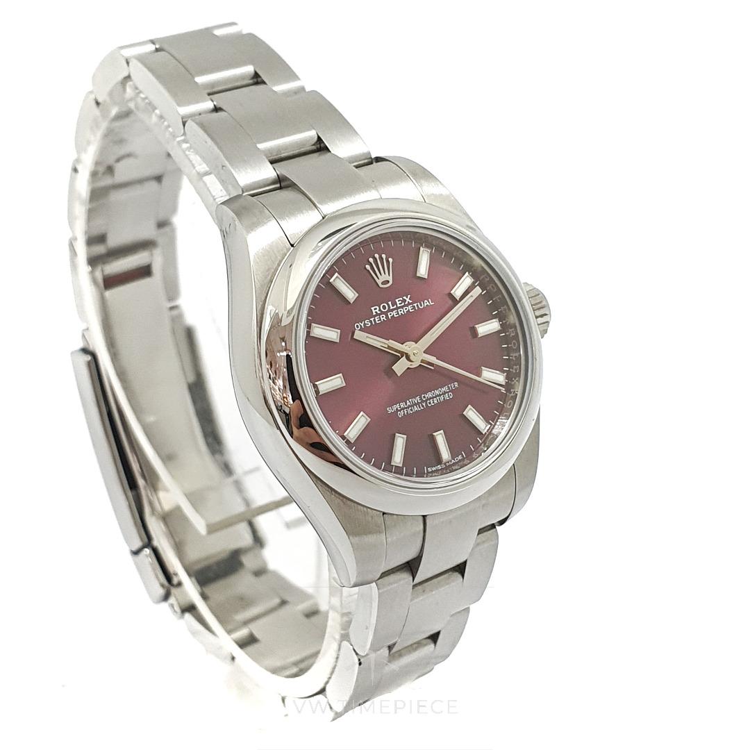 Rolex Oyster Perpetual 26 Ref 176200 Purple Grape Dial (2019) (Category: Watches) located in Singapore. Submitted by vwtimepiece (Listing ID 1186136863, Image 2). Description: Rolex Oyster Perpetual 26 Purple (discontinued colour!) Comes with: tag and warranty card dated May 2019 (Singapore). No original Rolex box. 12 months in-store warranty for movement SKU: V1E Ref: 176200 Serial: AN Year: 2019 Dial: Sunburst 'Grape' purple dial (discontinued 