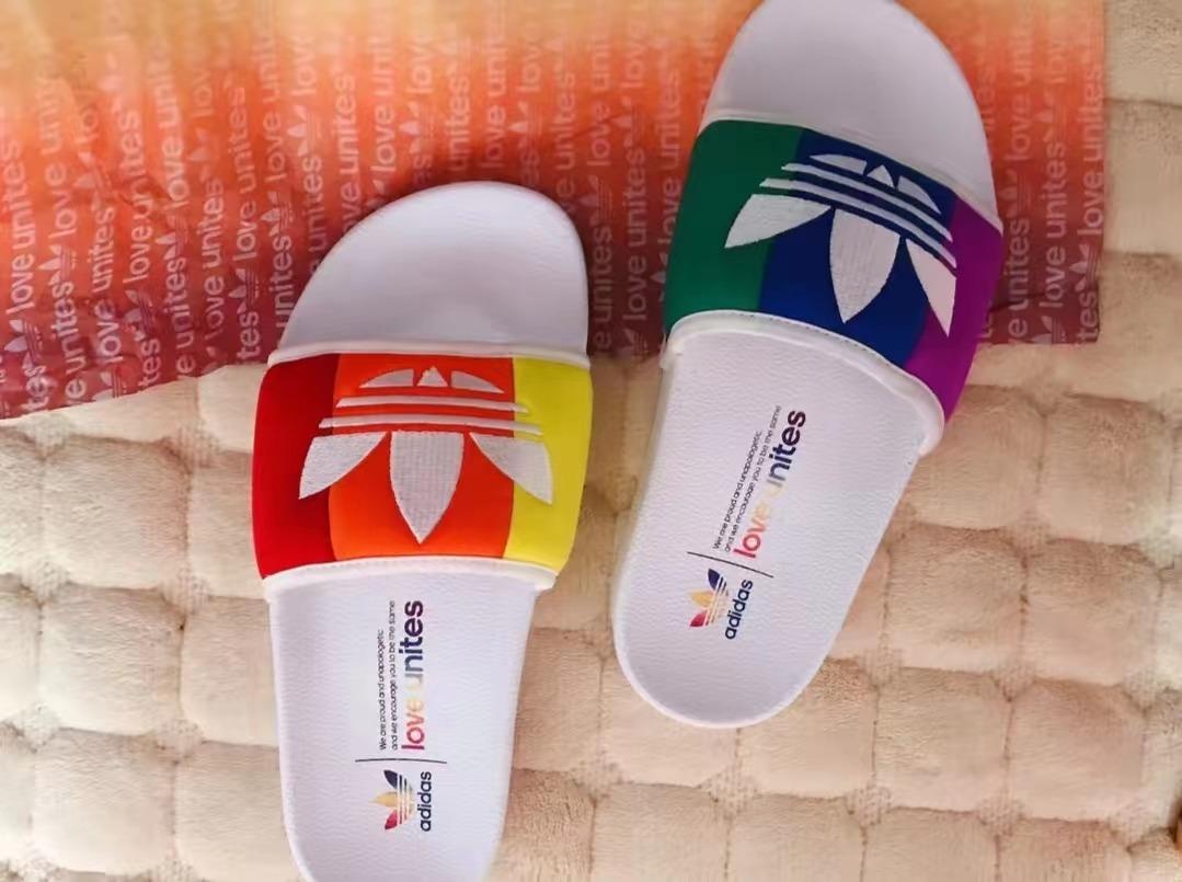 Adidas originals adilette pride slides hot sale