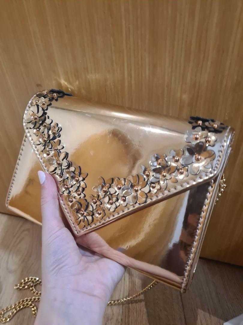 Aldo rose gold on sale clutch