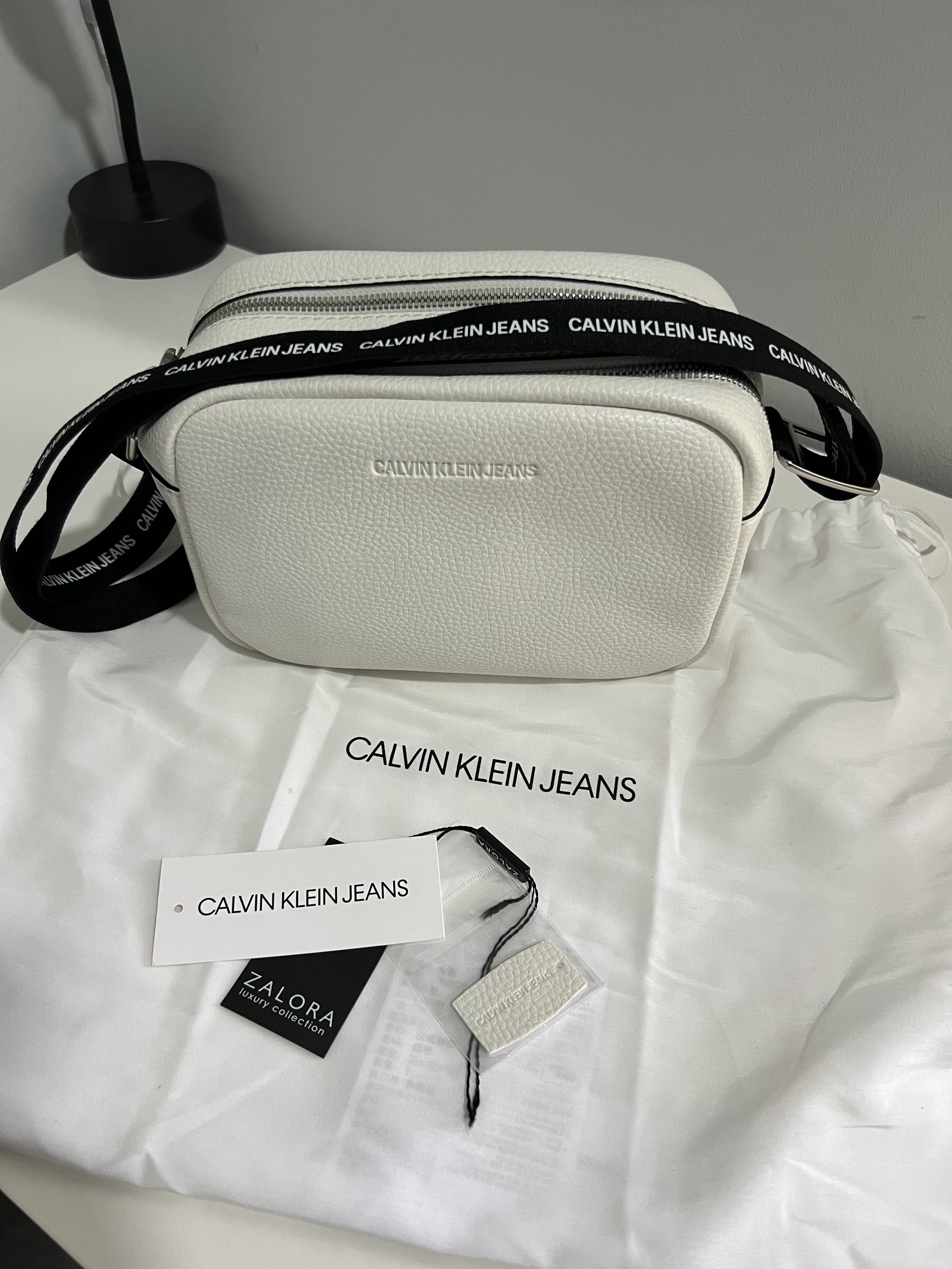 Calvin klein camera bag in white Luxury Bags Wallets on Carousell