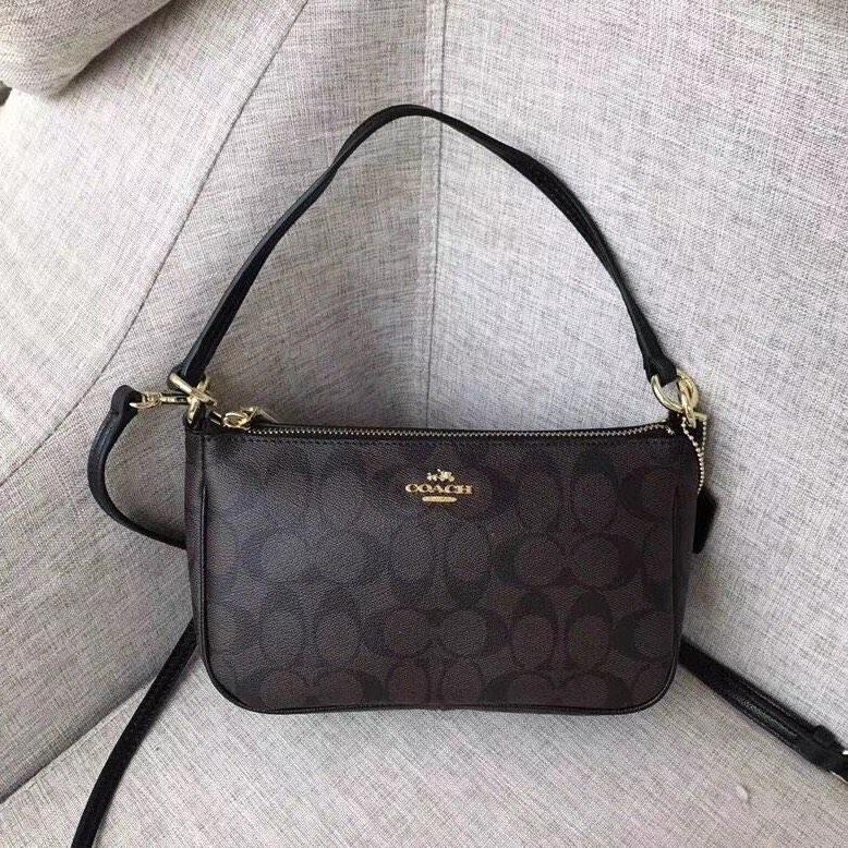 Coach top handle pouch in signature canvas best sale