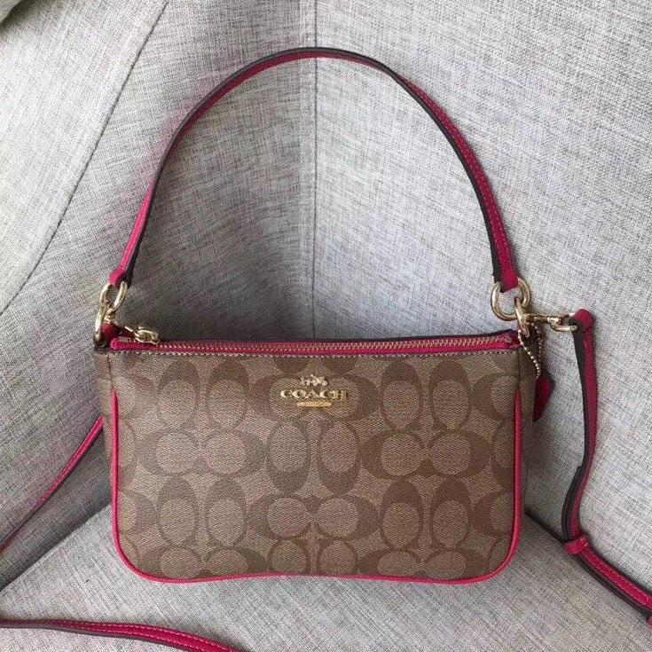 Coach pouch hotsell top handle