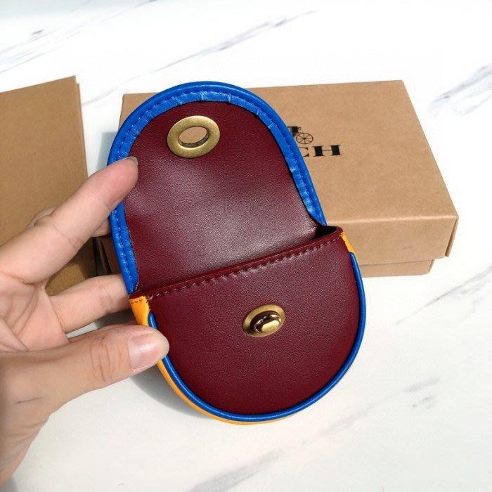 Saddle bag charm in signature chambray store