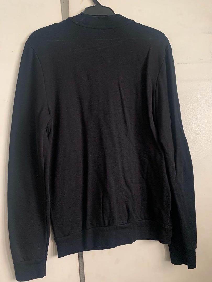 Topman bomber jacket (Category: Coats, Jackets and Outerwear) located in Quezon City. Submitted by hellogoodbri (Listing ID 1186315830, Image 3). Description: - In great condition; barely used. No flaws. - details: - 100% cotton - size: XXS but it fits like an XS - color: Black - measurements: Shoulder width: 17.5 in Chest: 18.5 in Length: 25 in.