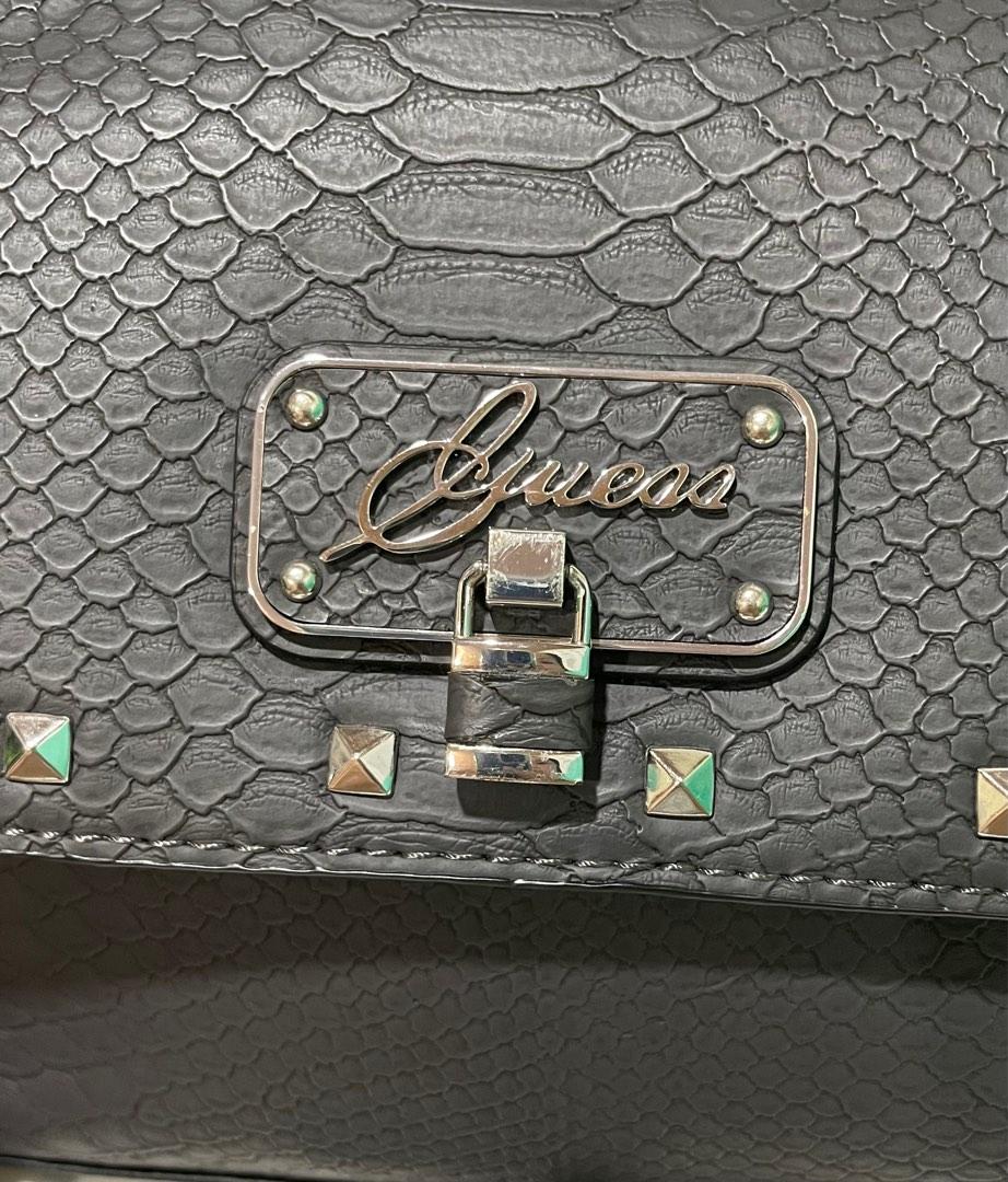 Guess purse handbag with top handle and side strap (Category: Cross-body Bags) located in Binangonan. Submitted by _heyjude (Listing ID 1186577197, Image 3). Description: 8.5x7x3 inches 💯 authentic NO FLAWS in mint condition. Super nice in actual. .