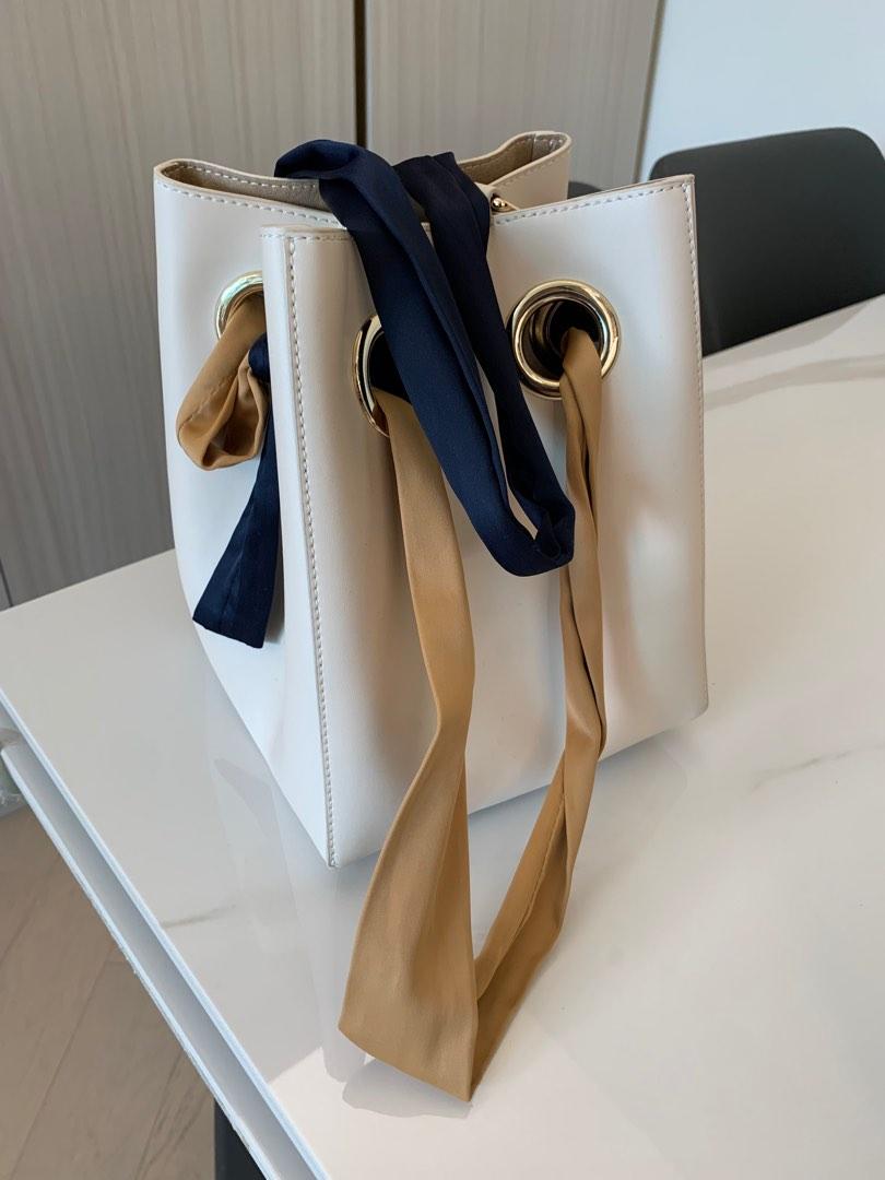 Unitude ribbon handle bucket bag