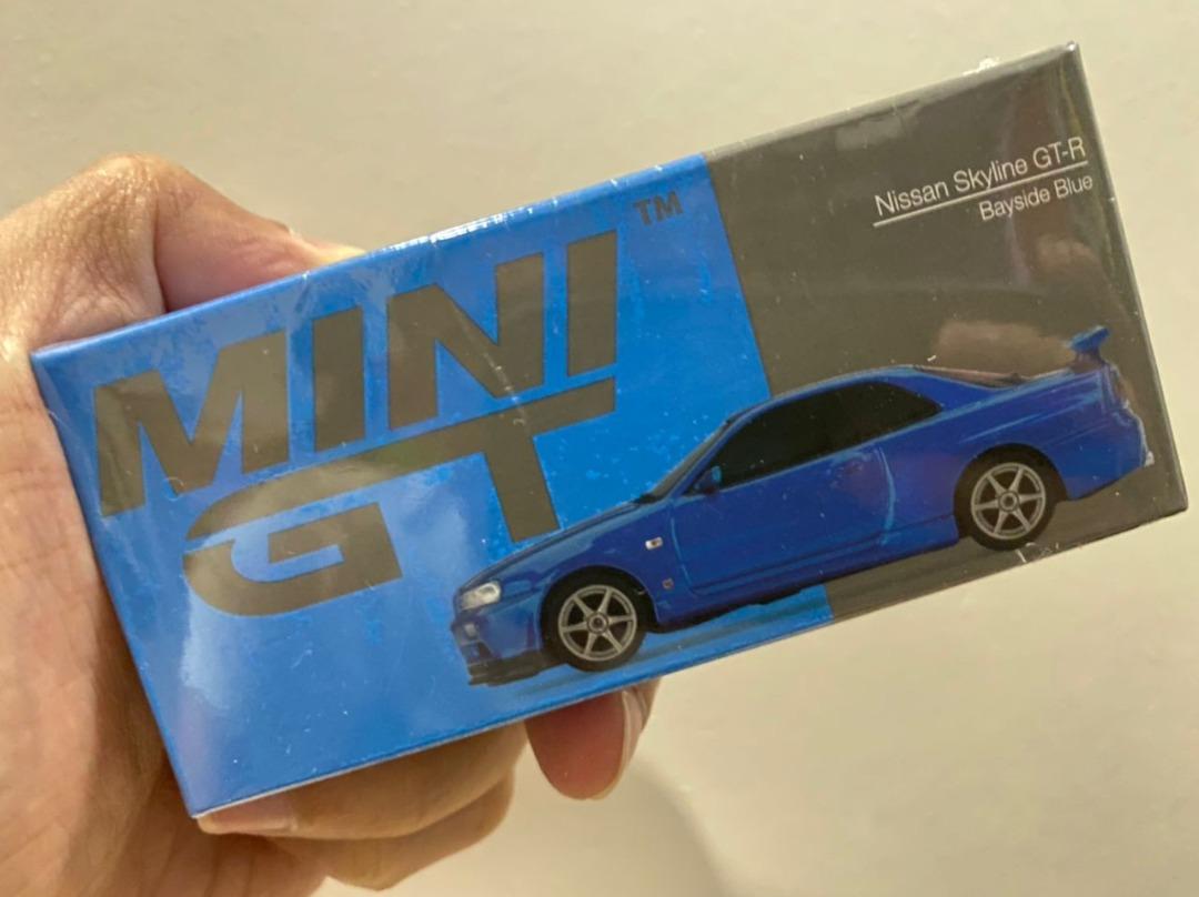 1:64 Scale Mini GT Nissan Skyline GT-R (R34) V Spec II Bayside Blue #341,  Hobbies  Toys, Toys  Games on Carousell