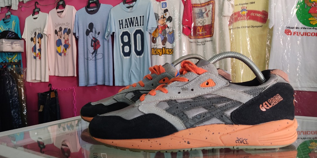 Asics gel saga deals orange grey