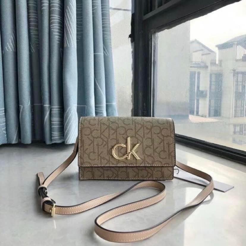 NEW! CALVIN KLEIN CK BROWN RED DOUBLE ZIP CROSSBODY SLING BAG PURSE $148  SALE, Women's Fashion, Bags & Wallets, Cross-body Bags on Carousell