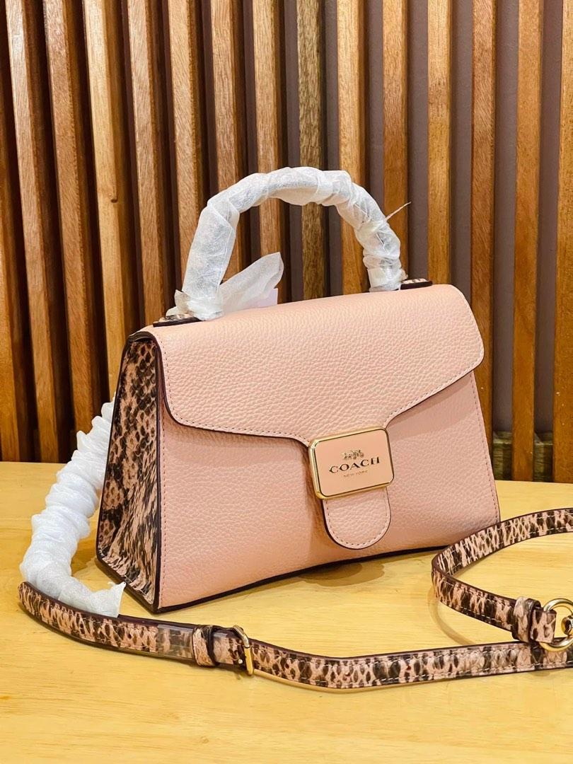 Coach bag sales with pink trim