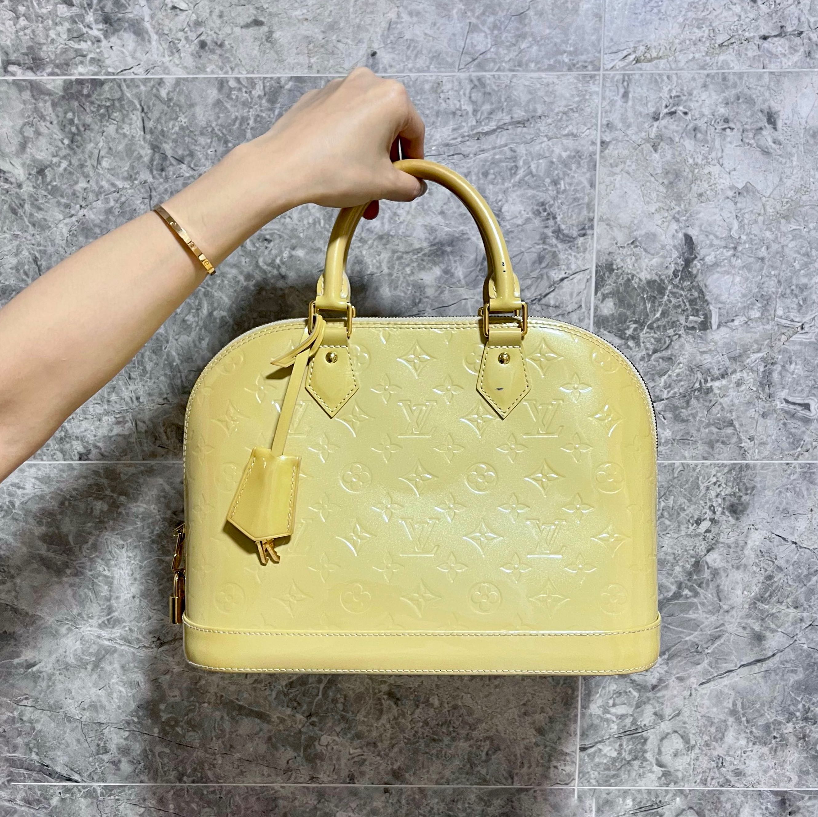 Gorgeous Louis Vuitton Alma handbag in Yellow epi leather, GHW at 1stDibs