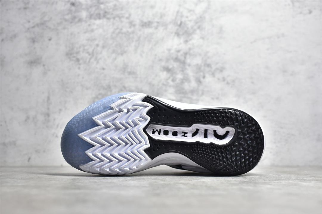 White and black sales nike basketball shoes