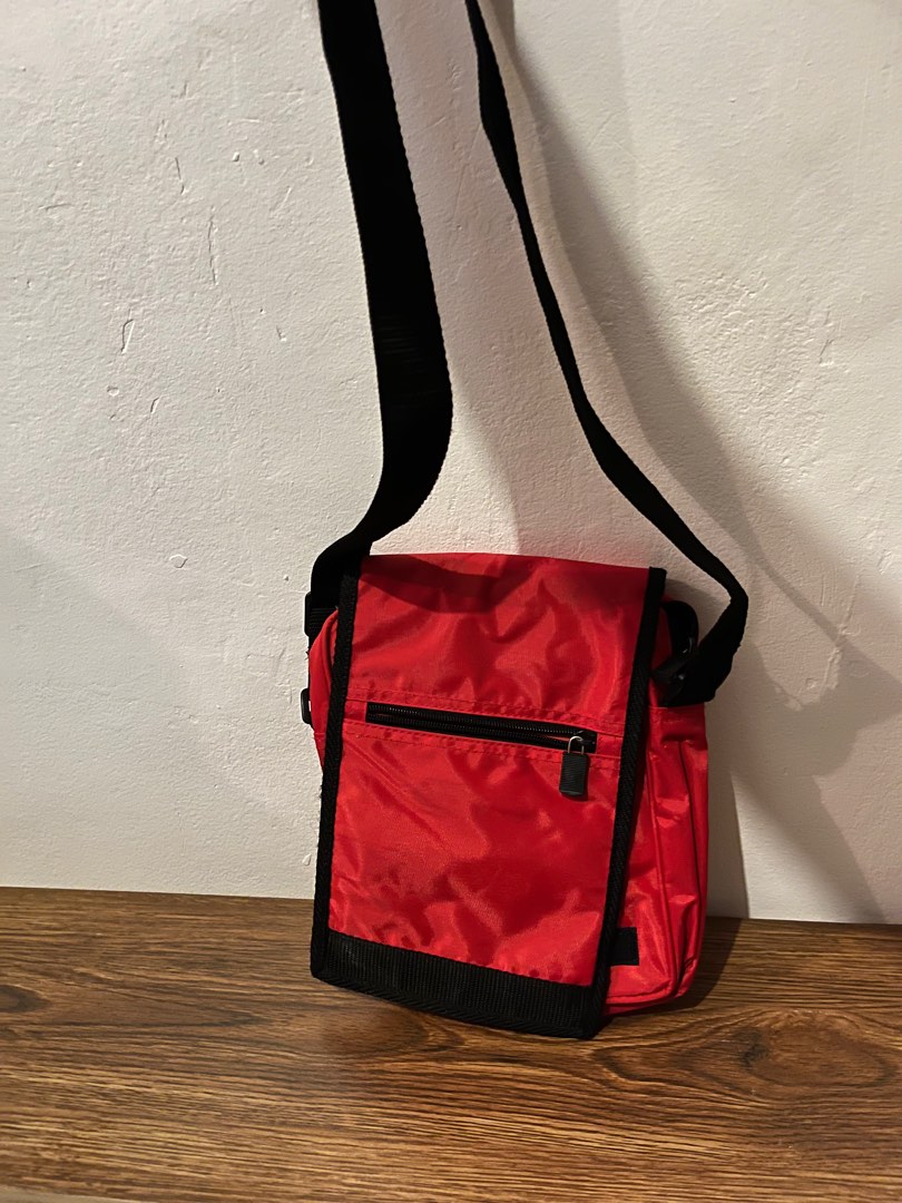 Red sling envelope sling bag