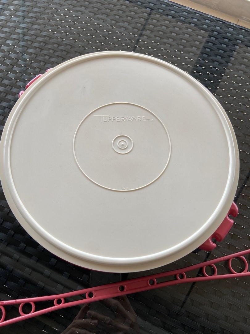 Tupperware (Category: Food Organisation & Storage) located in Singapore. Submitted by jq.style (Listing ID 1186871985, Image 3). Description: Tupperware container for sales. Great for festive sweets, cookies & nuts. Dia: 31 cm Height of container: 4 cm.