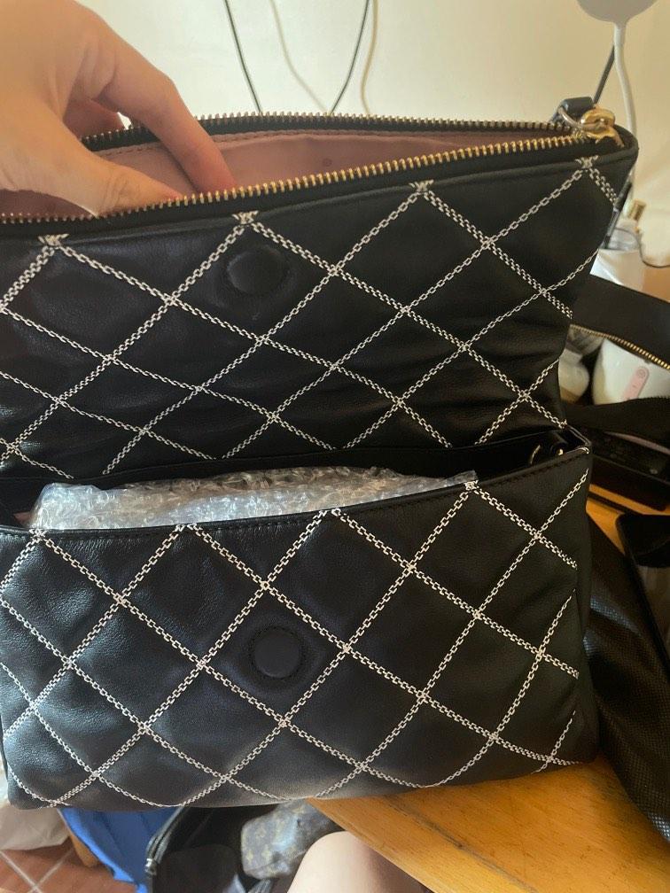 Authentic Kate Spade Emerson Place sling/clutch bag (Category: Cross-body Bags) located in Batangas. Submitted by bbbeyondph (Listing ID 1187075142, Image 2). Description: Authentic KS New York gold hardware ✨ 10/10‼️‼️ leather / body ✨ 10/10 ‼️‼️ Flaw: unwashable stains inside (open compartment) but the inside of edge-zip pocket still clean see pics for details ✨✨✨✨ A diamond-quilted finish heightens the vintage sophistication of a slim leather 