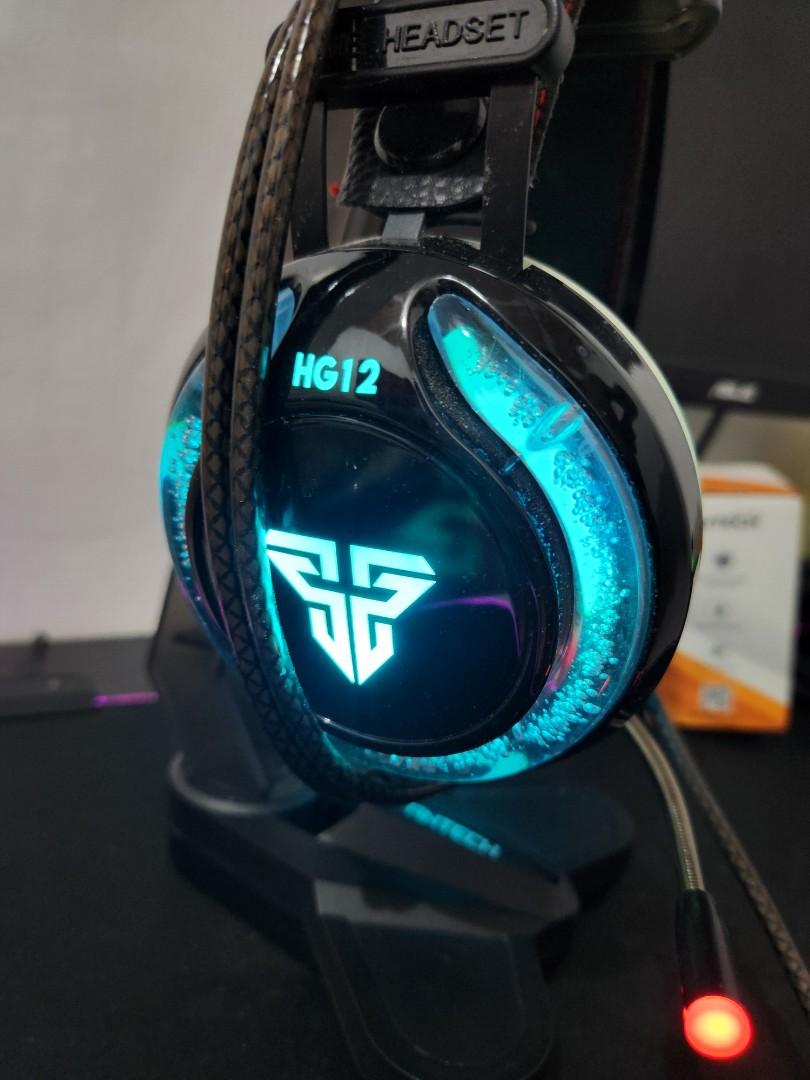 Gaming Headset (Category: Headphones & Headsets) located in Mandaluyong City. Submitted by grachi (Listing ID 1187225448, Image 2). Description: Fantech gaming headset with stand. Bought this set for 1,500. issue - nabakbak lang yung cushion kaya tinanggal ng Kuya ko price is negotiable.