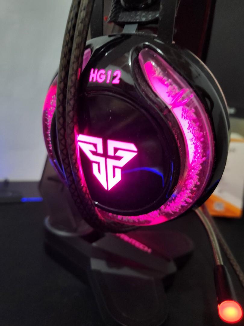 Gaming Headset (Category: Headphones & Headsets) located in Mandaluyong City. Submitted by grachi (Listing ID 1187225448, Image 3). Description: Fantech gaming headset with stand. Bought this set for 1,500. issue - nabakbak lang yung cushion kaya tinanggal ng Kuya ko price is negotiable.