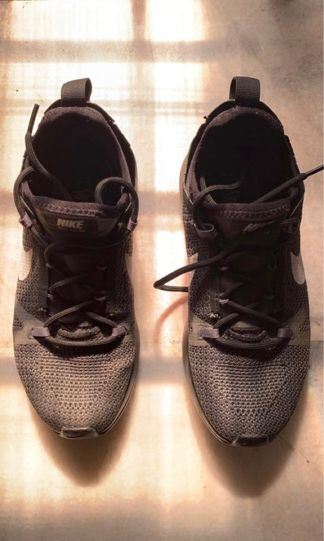 nike duel racer on feet