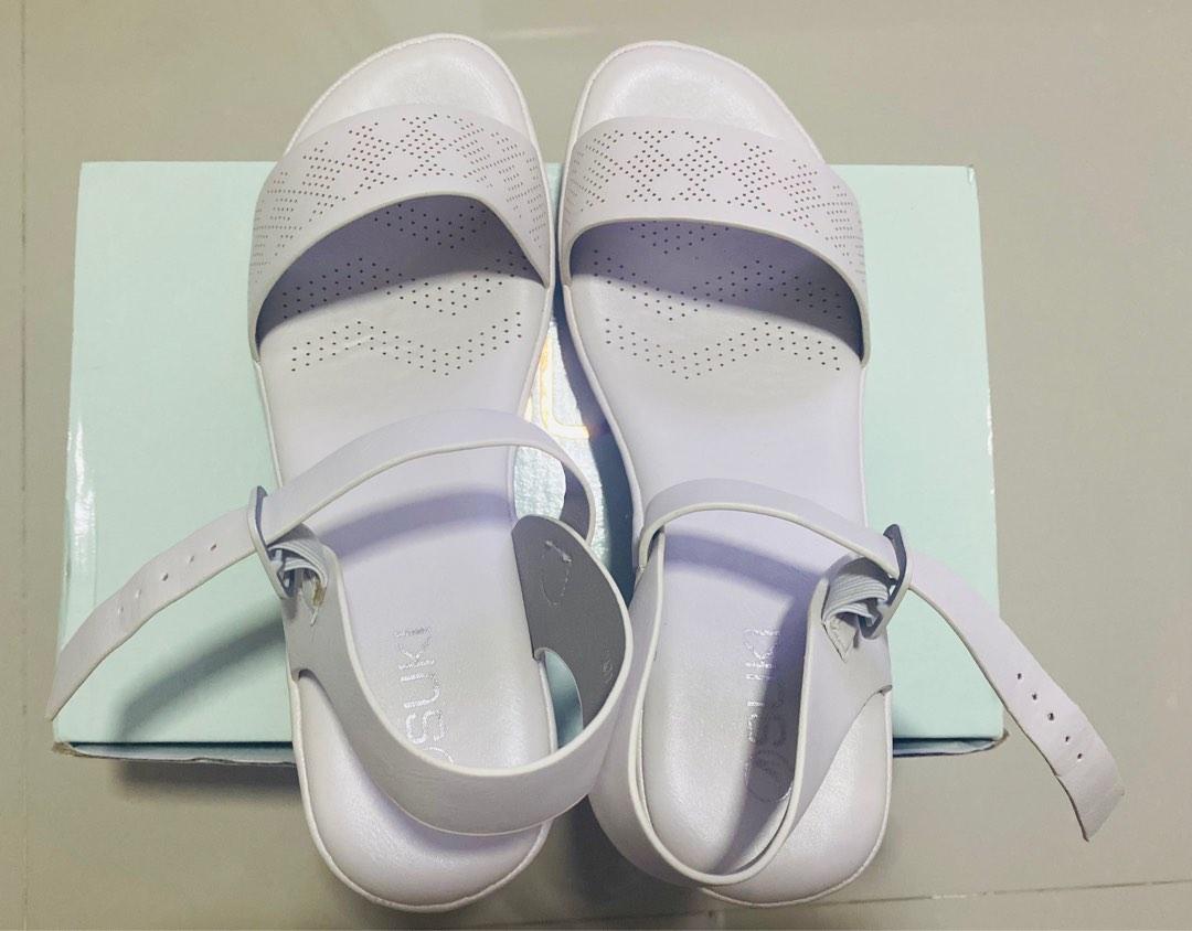 Suki Casual Sandals White (Category: Heels) located in San Fernando. Submitted by nyl001 (Listing ID 1187242059, Image 1). Description: Once lang po naisuot. P2,000 orig price sa mall 3 inches heel Size: 7 US Please see the uploaded photo for product details.