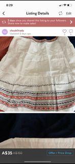 Tommy Hilfiger skirt with embroidery size 10 zipper in the side