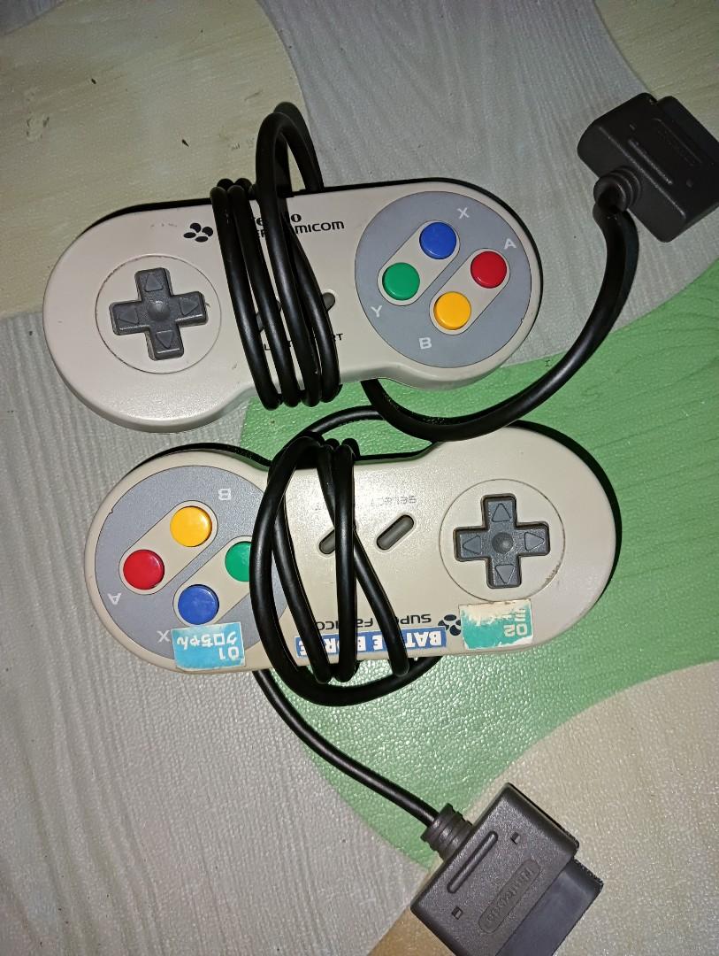 Vintage Super Famicom (Category: Nintendo) located in Antipolo. Submitted by carnagevisors1990 (Listing ID 1187197548, Image 3). Description: Vintage Nintendo Super Famicom MADE IN JAPAN Tested working. AS IS. Unit ( 110v) 2 controllers av cable power adaptor 5 game carts location Antipolo City. lalamove sagot Ng buyer or flash express sa malayo Luzon 100 vizmin 200..