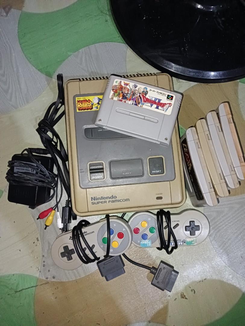 Vintage Super Famicom (Category: Nintendo) located in Antipolo. Submitted by carnagevisors1990 (Listing ID 1187197548, Image 1). Description: Vintage Nintendo Super Famicom MADE IN JAPAN Tested working. AS IS. Unit ( 110v) 2 controllers av cable power adaptor 5 game carts location Antipolo City. lalamove sagot Ng buyer or flash express sa malayo Luzon 100 vizmin 200..