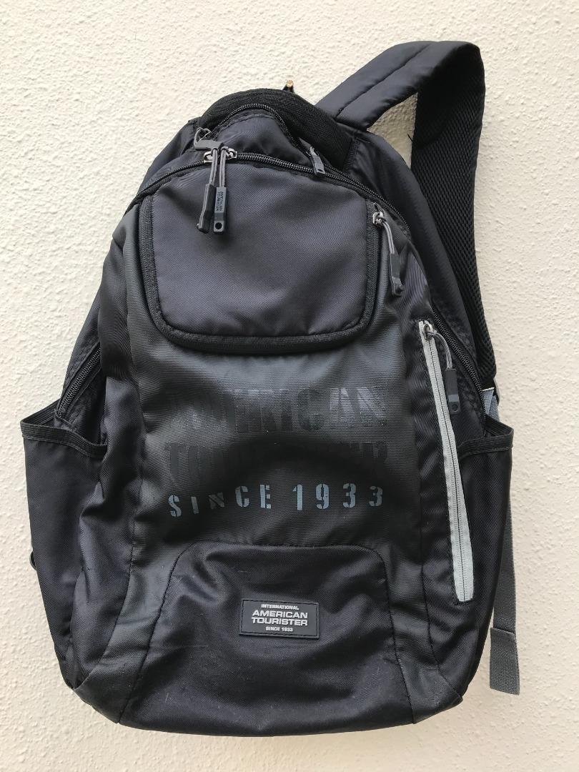 American Tourister backpack with rain cover 16 in good condition, Men