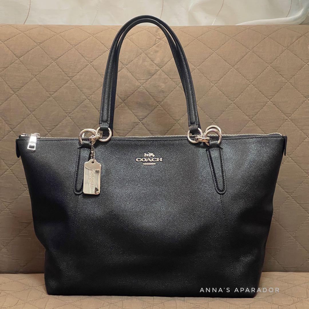 Authentic COACH AVA in Black & Silver Hardware (Category: Luxury Bags & Wallets) located in Antipolo. Submitted by annas_aparador (Listing ID 1187303115, Image 1). Description: Features: • Brand: Coach • Color: Black • Material: crossgrain leather • Inside zip, cell phone and multifunction pockets • Zip-top closure, fabric lining • Silver tone hardware • Handles with 9” drop • Outside slip pocket • Dimensions: 12 1/2” (L) x 9 3/4” (H) x 5” (W) **