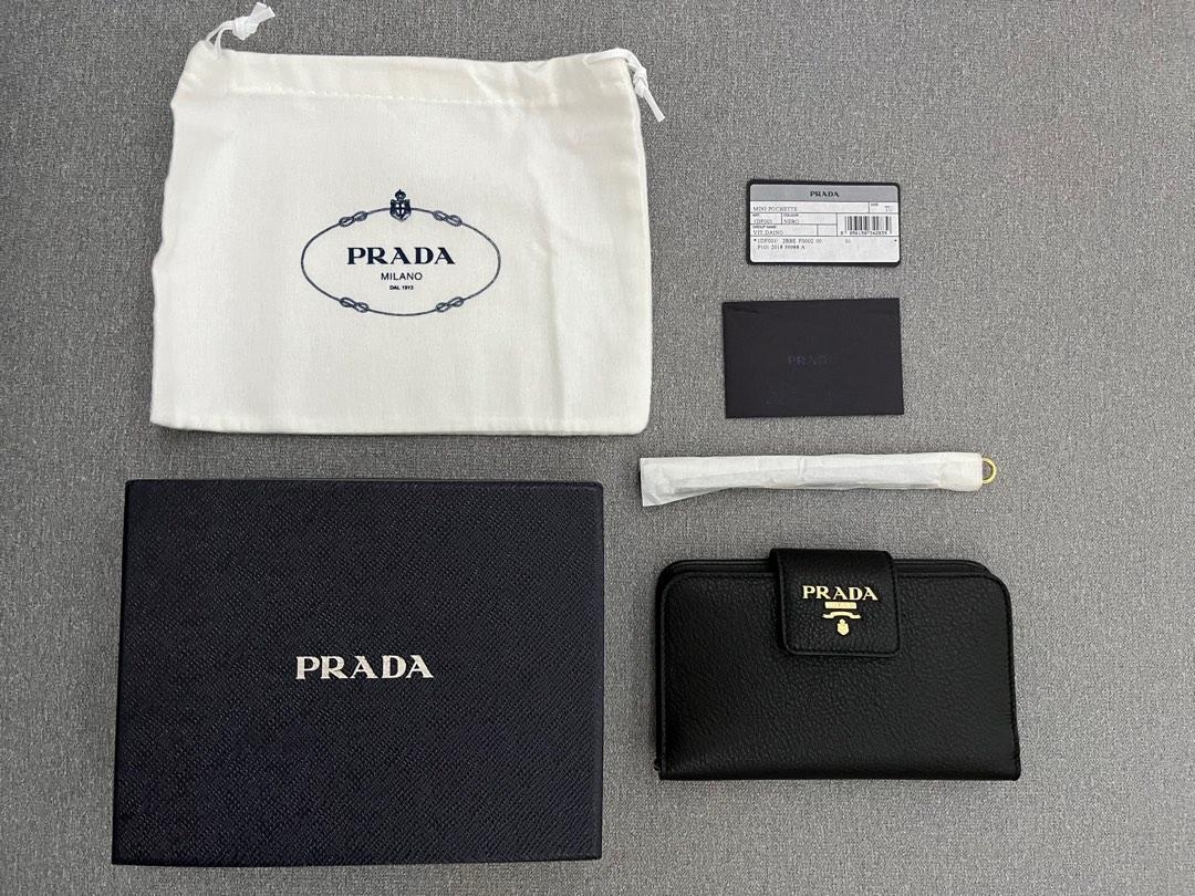 Prada wallet/wristlet (Category: Luxury Bags & Wallets) located in Cavite. Submitted by summerbyy (Listing ID 1187477572, Image 1). Description: Brand new Comes complete with Prada paper bag Can fit small phone.