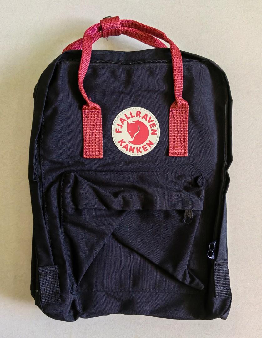 Black kanken red straps hotsell