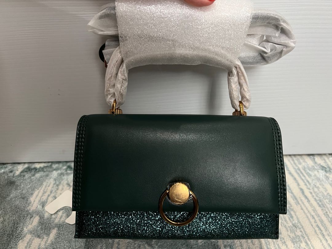 Metallic ring sales push lock bag