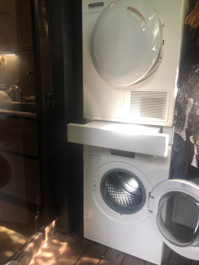 Miele washer, Dryer and pull out drawer with table, TV & Home