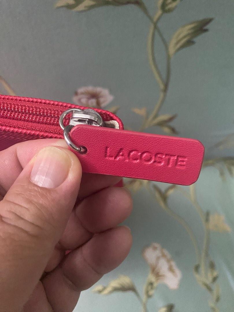 Authentic lacoste bag vs fake deals
